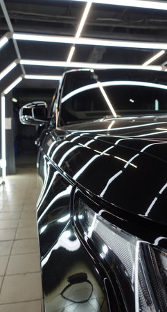 Clean shiny car at the car wash in detailingの写真素材