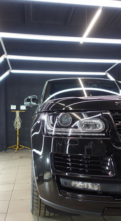 Clean shiny car at the car wash in detailingの写真素材