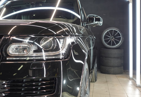 Clean shiny car at the car wash in detailingの写真素材