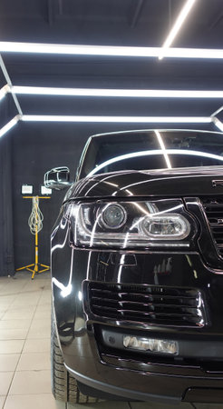 Clean shiny car at the car wash in detailingの写真素材