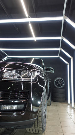 Clean shiny car at the car wash in detailingの写真素材