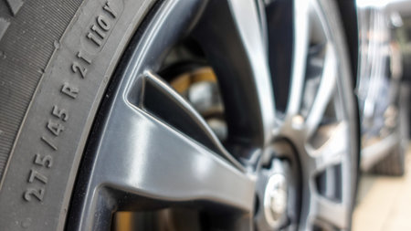 Wheels and tires on a clean carの写真素材