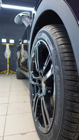 Wheels and tires on a clean carの写真素材