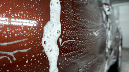 Water drops on the car bodyの写真素材