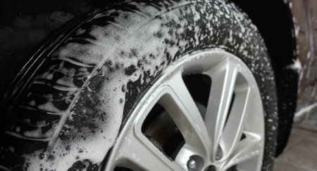 Wheels and tires on a clean carの写真素材