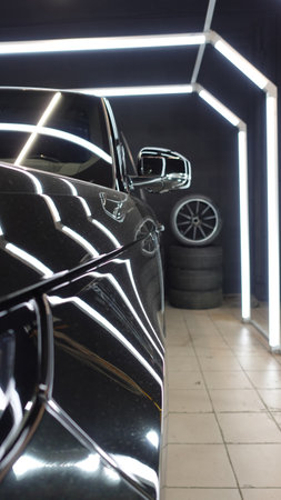 Clean shiny car at the car wash in detailingの写真素材