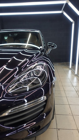 Clean shiny car at the car wash in detailingの写真素材