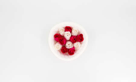White wicker vase with rosesの写真素材
