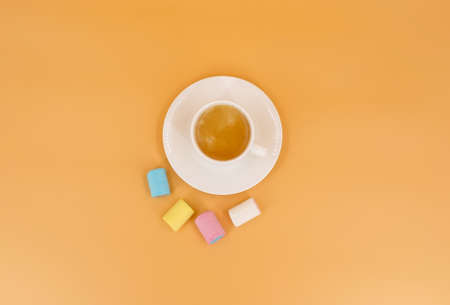 Coffee in a white cup with marshmallowsの写真素材