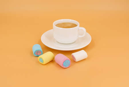 Coffee in a white cup with marshmallowsの写真素材