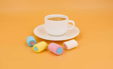 Coffee in a white cup with marshmallowsの写真素材