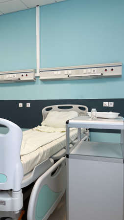 A bottle of pills in a hospital roomの写真素材