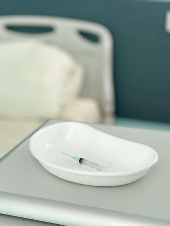 A syringe in the injection bath in the hospitalの写真素材