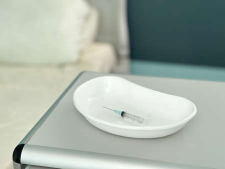 A syringe in the injection bath in the hospitalの写真素材
