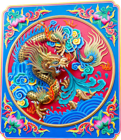 Golden Dragon sculpture in public chinese templeの写真素材