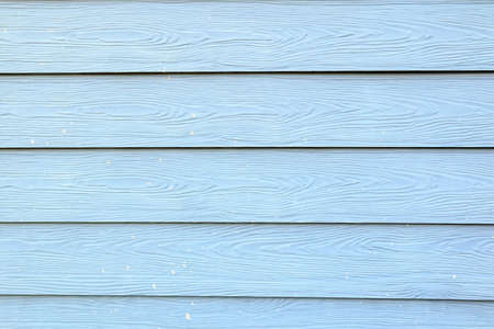 light blue wood wall background in houseの写真素材