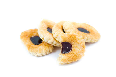 cookies with blueberry flavored jam  on white background