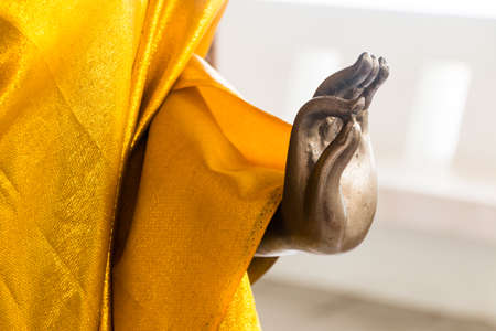 beautiful hand's buddha  statue in public templeの写真素材
