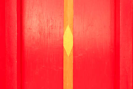 Closed Thai Red door in public templeの写真素材