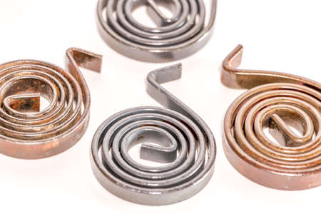 Spiral spring on white background