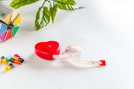 Stethoscope with tools on white backgroundの写真素材