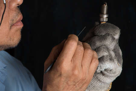 Auto mobile and motorcycle mechanic. Add the pieces to change.の写真素材