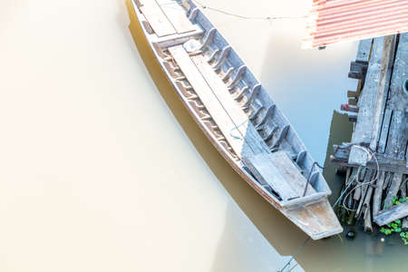 Water House people who live the river in thailand with wooden boat and water plant.の写真素材