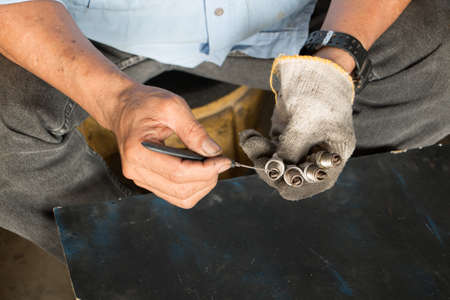 Auto mobile and motorcycle mechanic. Add the pieces to change.の写真素材