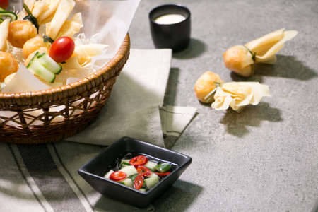 Traditional asian Fried dumplings on bucket.の写真素材