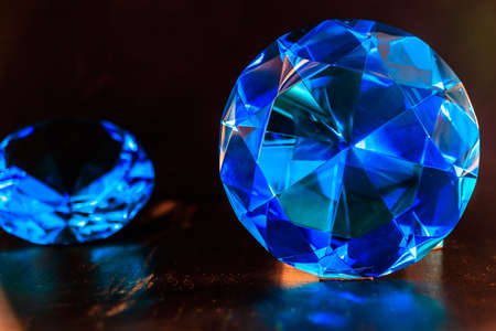 Fine luxury blue ocean diamond. Jewelry decoration on the dark background.の写真素材