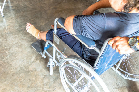 Person injured sit on wheelchair.