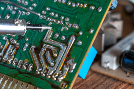 Electronic circuit board Computer motherboard with a view of parts and componentsの写真素材