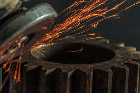 Industrial background, industry, Sparks from grinding machine in workshop.の写真素材