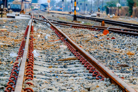 Train tracks leading into the sunsetの写真素材