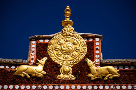 Wheel of Dharma and golden deers