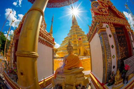 Pagoda and sunstar in thailand templeの写真素材