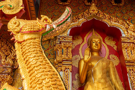 Golden Buddha statue in temple ,Thailandのeditorial素材