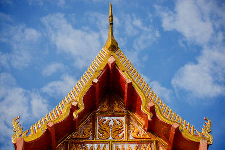thai temple roof with blue sky ,Thailandの写真素材