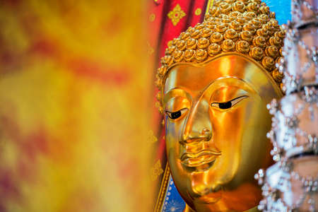 Golden Buddha statue in temple ,Thailandの写真素材