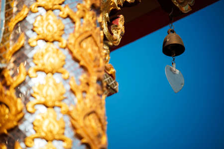 thai temple roof with blue sky ,Thailandの写真素材