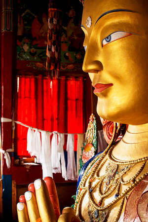 close up colorful sculpture of Maitreya buddha at Thiksey Monastery, Tibetan Buddhist monastery in Ladakhの写真素材