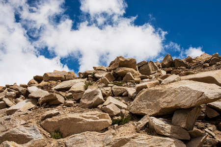 rock mountain and blue sky on high road to Chang La Pass third highest motorable road in the world LADAKH, INDIA - September ,2014の写真素材
