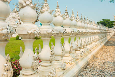 Wall conceptual sculpture decorations in Rongkhun Temple Chiangrai, Thailand.の写真素材