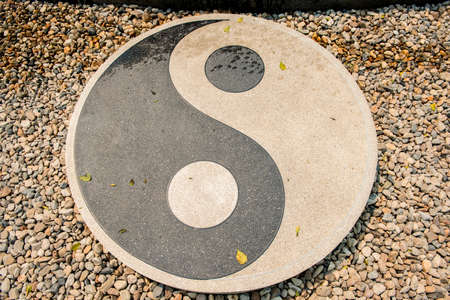 Stone of Yin-Yang symbol in Rongkhun Temple Chiangrai, Thailand.の写真素材