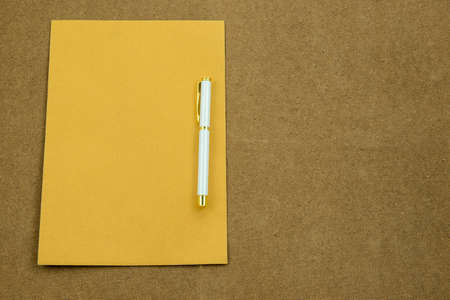 Blank envelope waiting for idea with penの写真素材