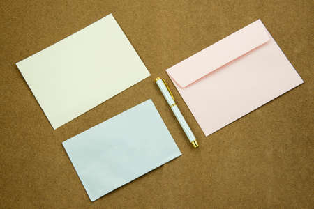 Blank envelope waiting for idea with penの写真素材