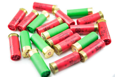 12 gauge shotgun shells isolated on a white background