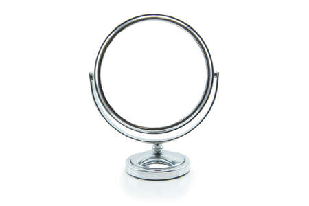 Old silver makeup mirror isolated on whiteの写真素材