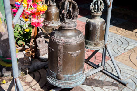 Large bronze buddhist bell at Phra Borommathat temple Tak Province ,Thailand.