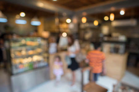Blur background of coffee shop with bokeh. Filter : Vintage effected.の写真素材